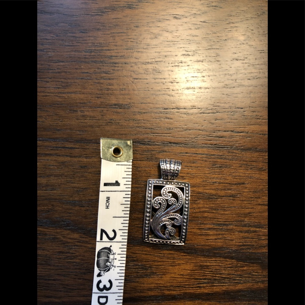Silpada silver pendant with beautiful wave/floral abstract design